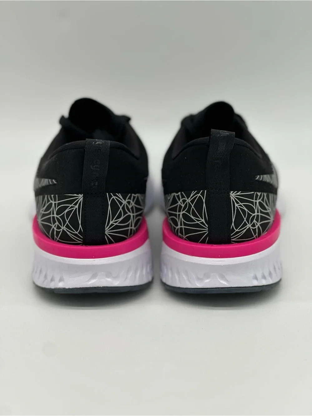 Nike Black Knit Running Sneakers with Pink Heel Accent
